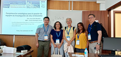 Profesor Juan Coss junto a colegas en Portugal